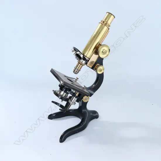 ERNEST LEITZ, WETZLER MICROSCOPE No.105503, w EBONIZED STIRRUP FOOT, CURVED LIMB, CONDENSER. MIRROR ABSENT. IN MAHOG BOX